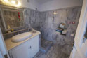 marblebath with shower and floor heating